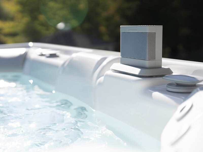 Close-up of the built-in speaker system included with a Hot Spring spa for creating a relaxing spa atmosphere.